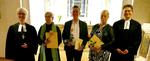 Oberkirchenrätin Gudrun Mawick (l.) und Pfarrer Cornelius Grohs (r.) zusammen mit der Prädikantin Dorothee Breger, dem Prädikanten Matthias Rensch und der Prädikantin Anke Michels.